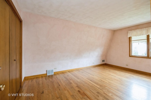 1707 N 78th Ave, Elmwood Park, IL 60707 - unfurnished room with light wood-type flooring