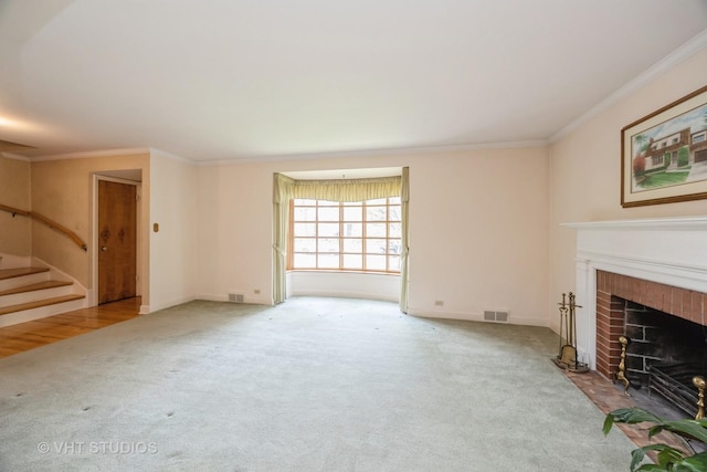 1707 N 78th Ave, Elmwood Park, IL 60707 - unfurnished living room with carpet flooring, stairway, a brick fireplace, and ornamental molding