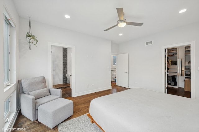 1633 N Saint Louis Ave, Chicago, IL 60647 - bedroom with a walk in closet, recessed lighting, dark wood-style flooring, connected bathroom, and ceiling fan