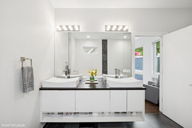 1633 N Saint Louis Ave, Chicago, IL 60647 - bathroom featuring double vanity, healthy amount of natural light, and tile patterned floors