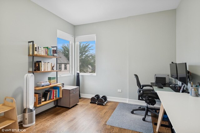 1633 N Saint Louis Ave, Chicago, IL 60647 - office area featuring light wood-style floors and baseboards