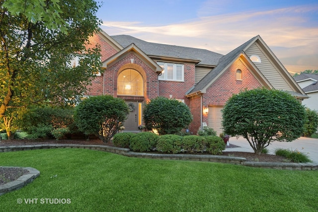 3136 Kewanee Ln, Naperville, IL 60564 - view of front of home with brick siding, a yard, an attached garage, and a shingled roof