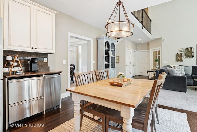 3136 Kewanee Ln, Naperville, IL 60564 - dining room with dark wood-style floors and a chandelier