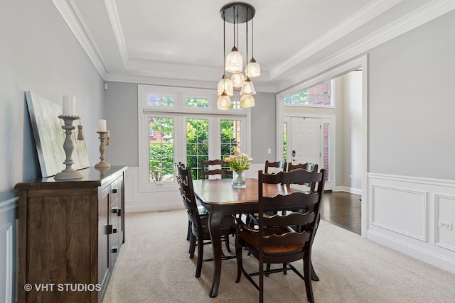 3136 Kewanee Ln, Naperville, IL 60564 - carpeted dining room featuring a chandelier, crown molding, a wainscoted wall, and a decorative wall