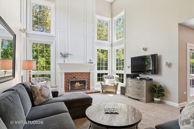 3136 Kewanee Ln, Naperville, IL 60564 - carpeted living room with a towering ceiling and a brick fireplace