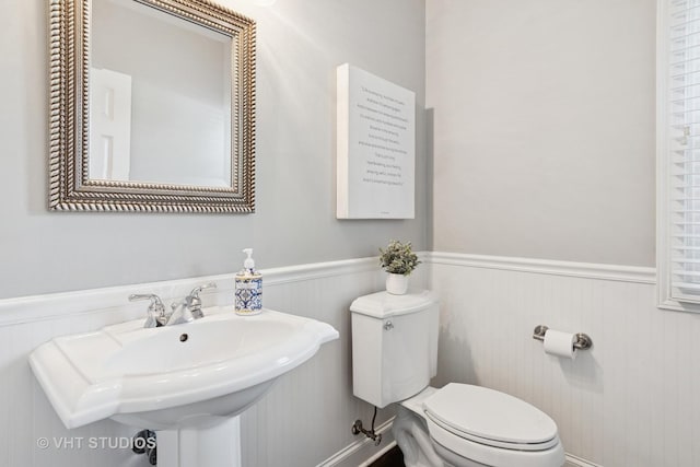 3136 Kewanee Ln, Naperville, IL 60564 - half bathroom with a wainscoted wall and toilet