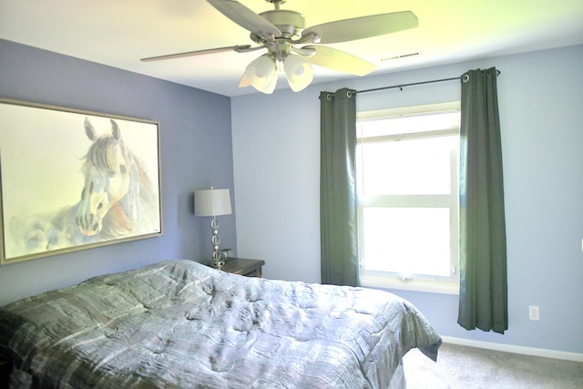 521 Coventry Ln Unit 16, Crystal Lake, IL 60014 - carpeted bedroom featuring a ceiling fan and baseboards