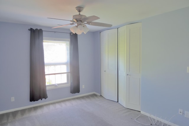 521 Coventry Ln Unit 16, Crystal Lake, IL 60014 - unfurnished bedroom with light colored carpet, a closet, baseboards, and ceiling fan