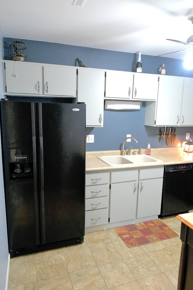 521 Coventry Ln Unit 16, Crystal Lake, IL 60014 - kitchen featuring black appliances, a sink, light countertops, and white cabinetry