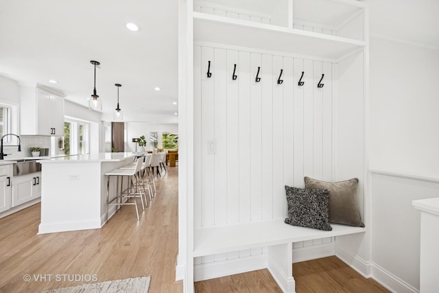 920 Hayes Ave, Oak Park, IL 60302 - mudroom featuring light wood-type flooring and recessed lighting
