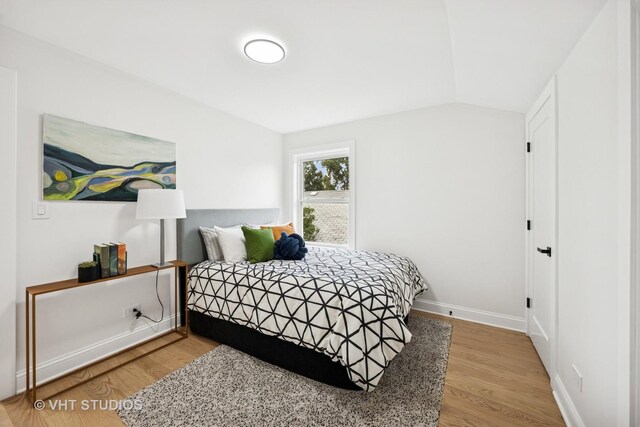 920 Hayes Ave, Oak Park, IL 60302 - bedroom with wood finished floors and vaulted ceiling