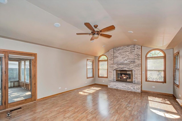 13706 W Cedarbend Dr, Homer Glen, IL 60491 - unfurnished living room featuring vaulted ceiling, ceiling fan, healthy amount of natural light, and wood finished floors
