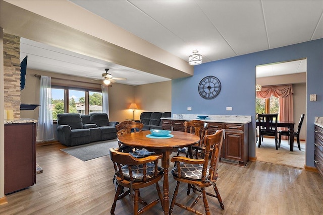 15031 Mayo Dr Unit 19D, Orland Park, IL 60462 - dining room with light wood-style flooring and a ceiling fan