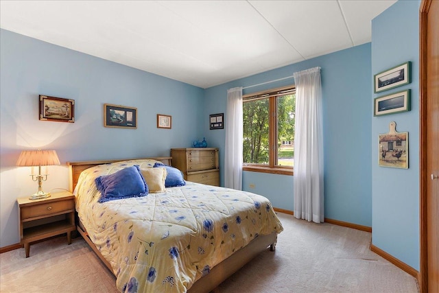 15031 Mayo Dr Unit 19D, Orland Park, IL 60462 - bedroom featuring light colored carpet and baseboards