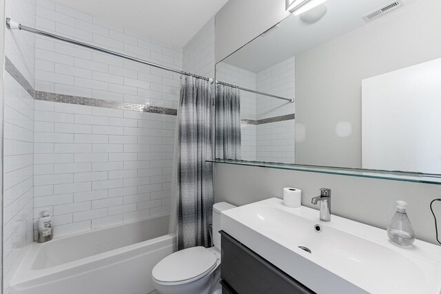 2143 W 19th St Unit 3, Chicago, IL 60608 - full bathroom featuring shower / bath combo, toilet, and vanity