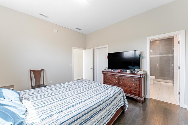 2143 W 19th St Unit 3, Chicago, IL 60608 - bedroom with dark wood finished floors and ensuite bath