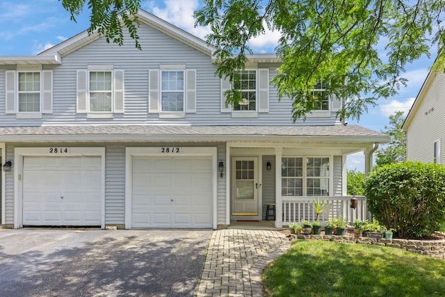 2812 Sun Valley Dr, Plainfield, IL 60586 - view of front of home with covered porch, driveway, and a garage