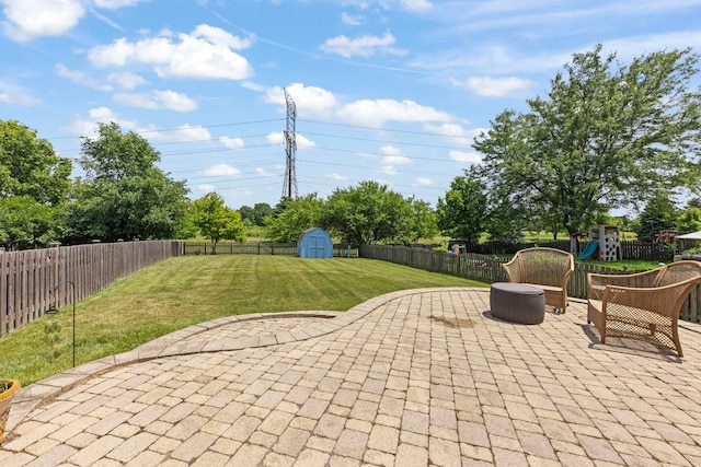 2812 Sun Valley Dr, Plainfield, IL 60586 - fenced backyard featuring a patio, a shed, and a playground