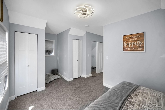 7825 S St Lawrence Ave, Chicago, IL 60619 - bedroom featuring carpet and two closets