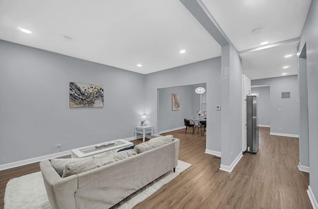 7825 S St Lawrence Ave, Chicago, IL 60619 - living area with dark wood finished floors and recessed lighting