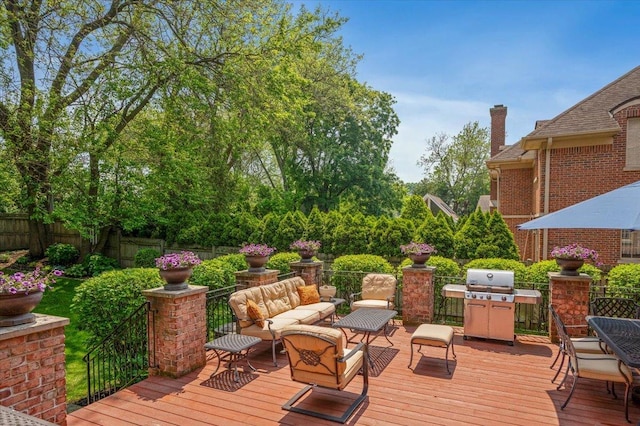 320 Vista Dr, Wilmette, IL 60091 - wooden terrace with an outdoor living space, a fenced backyard, outdoor dining area, and grilling area