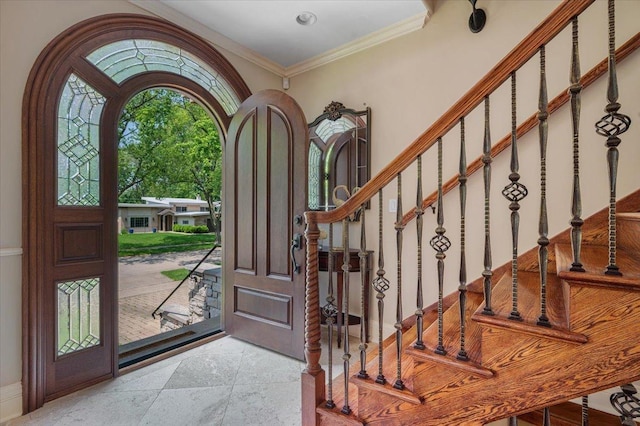 320 Vista Dr, Wilmette, IL 60091 - foyer entrance featuring ornamental molding and stairway
