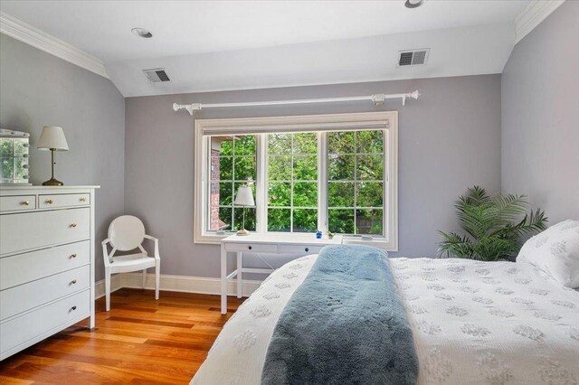 320 Vista Dr, Wilmette, IL 60091 - bedroom with ornamental molding and wood finished floors