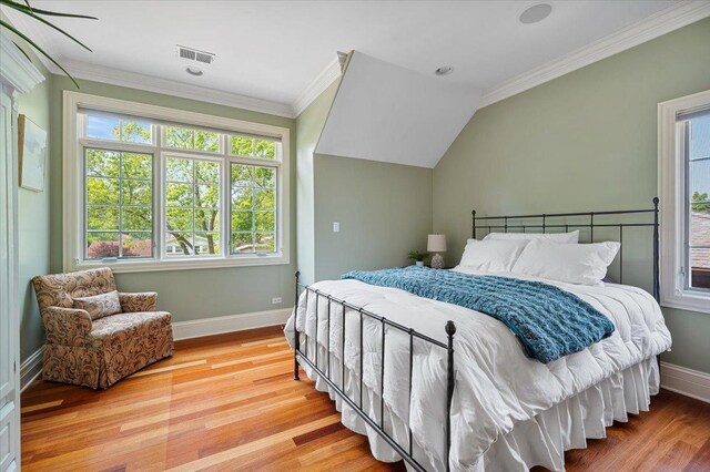 320 Vista Dr, Wilmette, IL 60091 - bedroom featuring wood finished floors, multiple windows, and ornamental molding