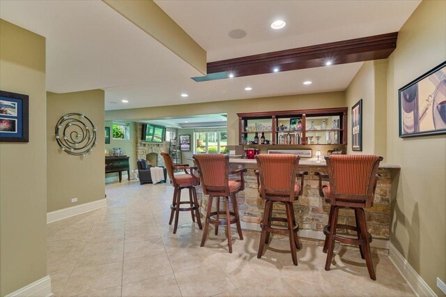 320 Vista Dr, Wilmette, IL 60091 - indoor bar with recessed lighting and light tile patterned floors