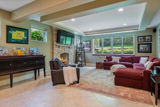 320 Vista Dr, Wilmette, IL 60091 - living area with a raised ceiling, a fireplace, recessed lighting, and light tile patterned floors