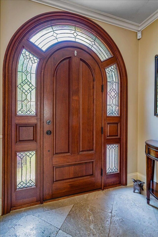 320 Vista Dr, Wilmette, IL 60091 - entryway featuring arched walkways and stone tile floors