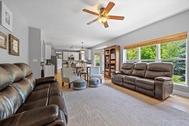 0S587 Grengs Ln, Geneva, IL 60134 - living room featuring ceiling fan, light wood finished floors, and plenty of natural light