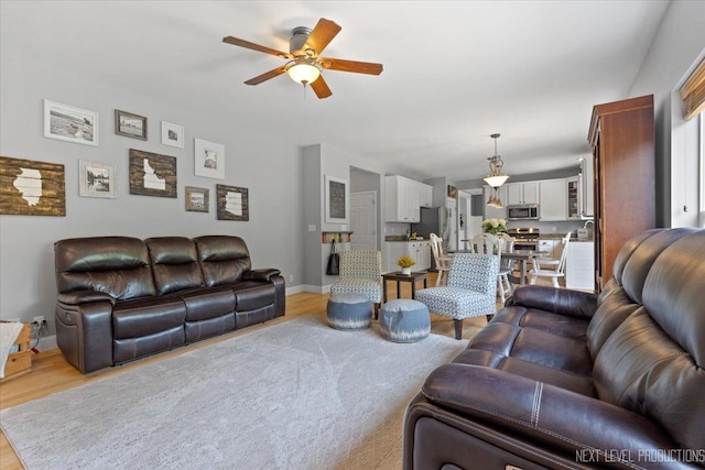 0S587 Grengs Ln, Geneva, IL 60134 - living area featuring light wood finished floors and ceiling fan