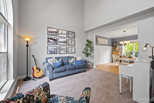 0S587 Grengs Ln, Geneva, IL 60134 - carpeted living area with a chandelier and a high ceiling