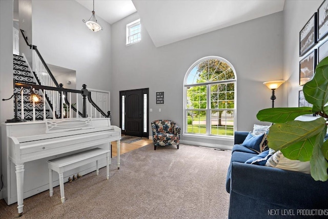 0S587 Grengs Ln, Geneva, IL 60134 - carpeted living area with high vaulted ceiling and stairs