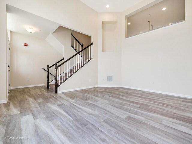 14017 S Belmont Dr, Homer Glen, IL 60491 - entrance foyer featuring stairway, wood finished floors, baseboards, and recessed lighting