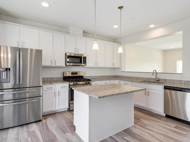 14017 S Belmont Dr, Homer Glen, IL 60491 - kitchen with stainless steel appliances, a sink, white cabinetry, light wood-style floors, and recessed lighting