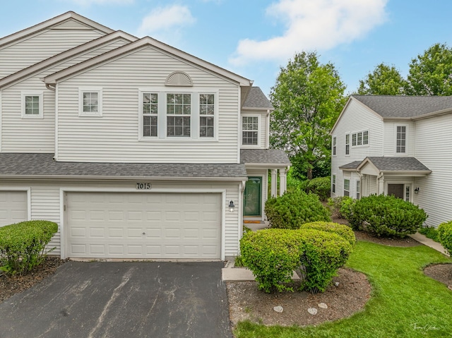 7015 Clearwater Dr Unit 7015, Plainfield, IL 60586 - traditional home with a garage, driveway, and roof with shingles