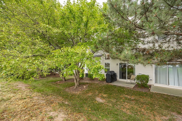 7015 Clearwater Dr Unit 7015, Plainfield, IL 60586 - view of green lawn with a patio area