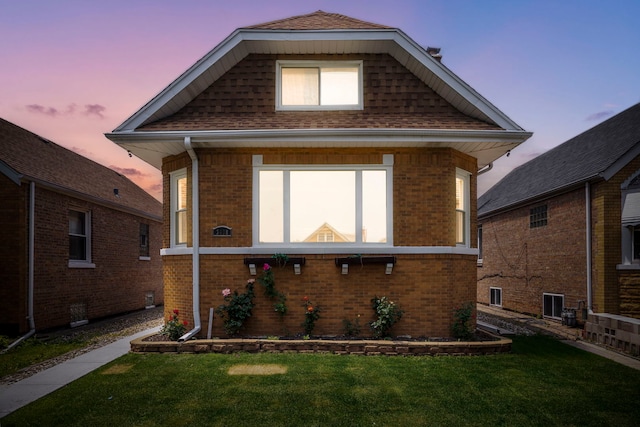 3408 S 58th Ave, Cicero, IL 60804 - view of front facade with a front yard and brick siding