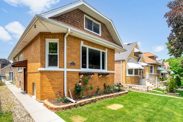 3408 S 58th Ave, Cicero, IL 60804 - view of front of home featuring brick siding, a front lawn, and roof with shingles