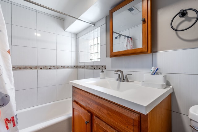 3408 S 58th Ave, Cicero, IL 60804 - bathroom featuring vanity and shower / bath combo