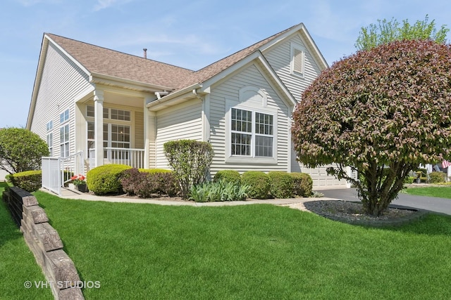 21359 W Sycamore Dr, Plainfield, IL 60544 - view of home's exterior with a yard and a shingled roof