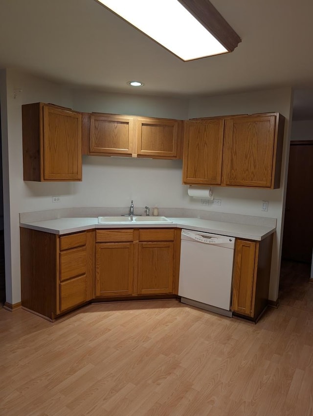 21359 W Sycamore Dr, Plainfield, IL 60544 - kitchen with white dishwasher, light wood finished floors, light countertops, brown cabinetry, and recessed lighting