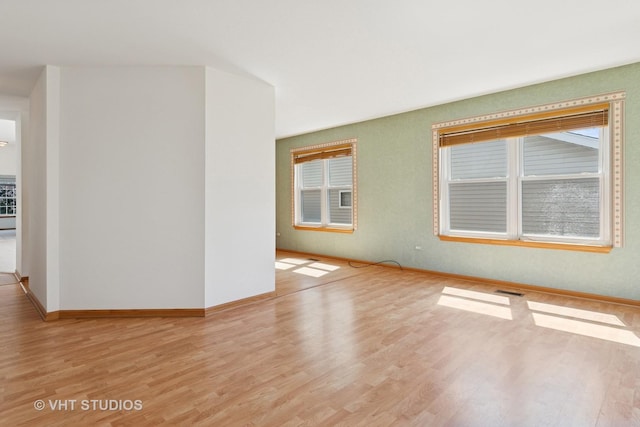 21359 W Sycamore Dr, Plainfield, IL 60544 - spare room with light wood finished floors and baseboards