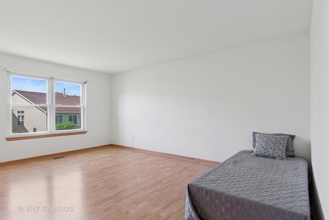 21359 W Sycamore Dr, Plainfield, IL 60544 - bedroom with light wood finished floors and baseboards