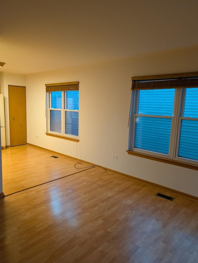 21359 W Sycamore Dr, Plainfield, IL 60544 - unfurnished room featuring wood finished floors and baseboards