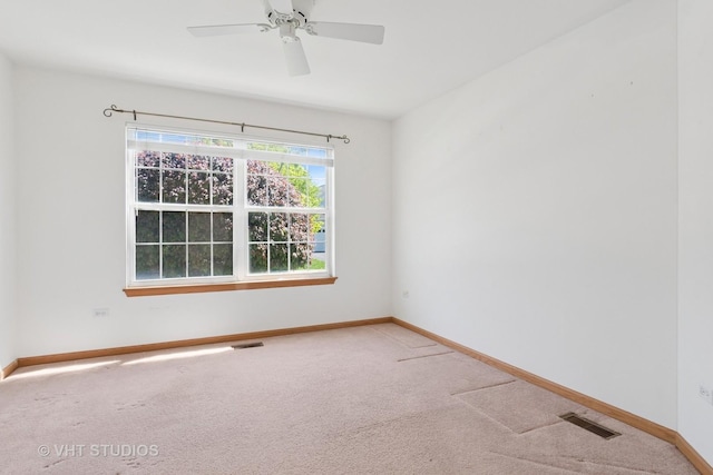 21359 W Sycamore Dr, Plainfield, IL 60544 - carpeted empty room featuring baseboards and a ceiling fan
