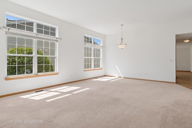 21359 W Sycamore Dr, Plainfield, IL 60544 - empty room with carpet floors and baseboards