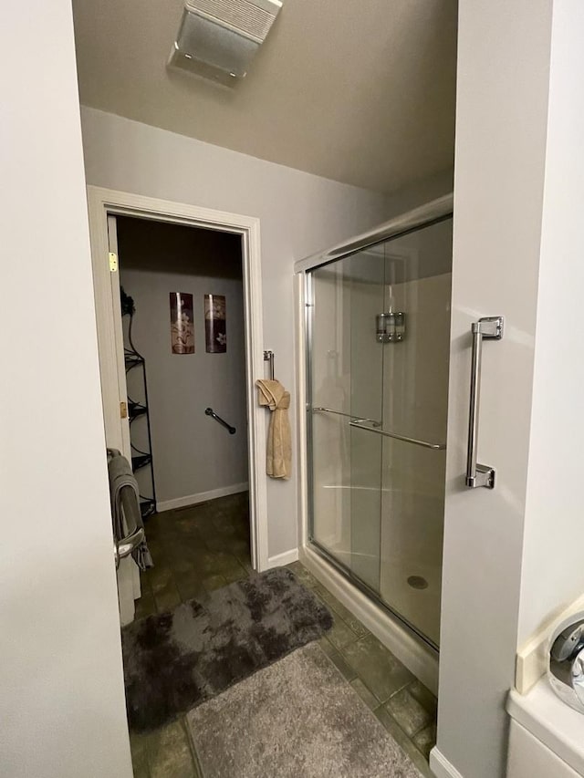 2500 Cherie Ln, Ottawa, IL 61350 - bathroom featuring a stall shower and baseboards